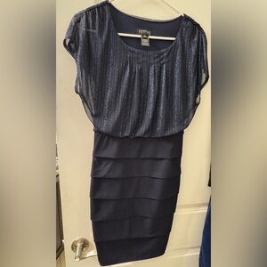 Woman’s Enfocus blue sparkle dress